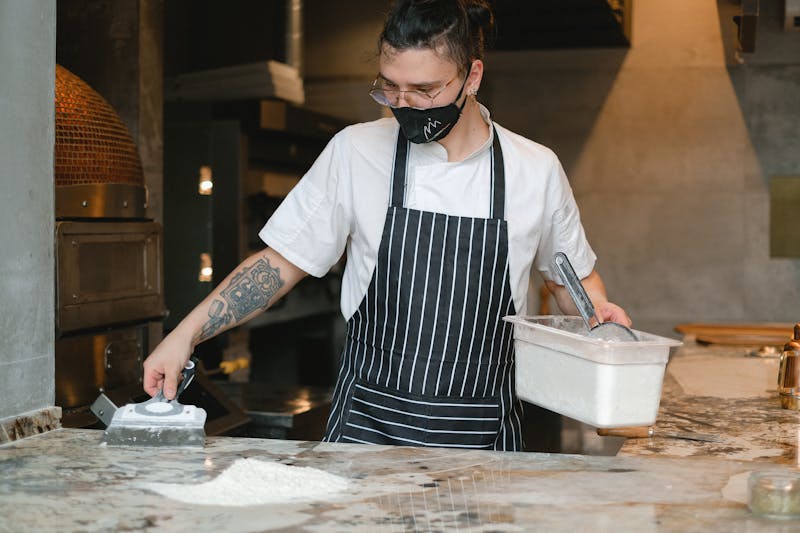 Apache Pizza open kitchen where fresh pizzas are made to order